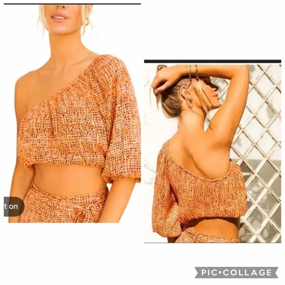 L* Space Revolve Nia one shoulder orange reptile printed crop top